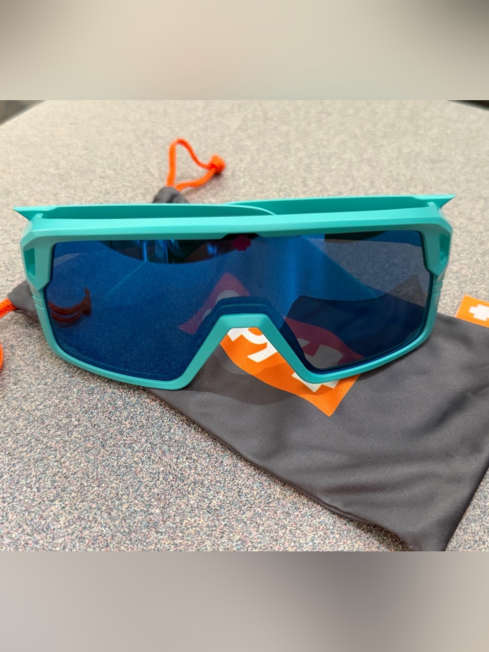 SPY Unisex Monolith Teal Frame Sunglasses with Blue Mirrored Lens